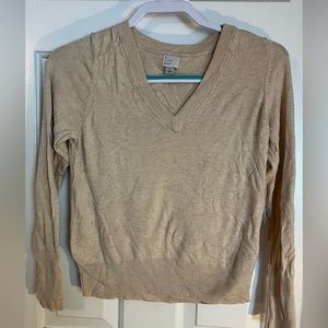 A New Day v neck sweater. Cream color. New. No tags. Size small. Ribbed bottom.